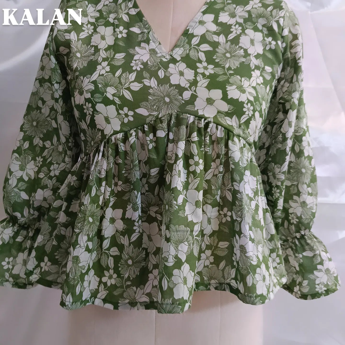 Green Floral Peplum Top – Natural & Stylish