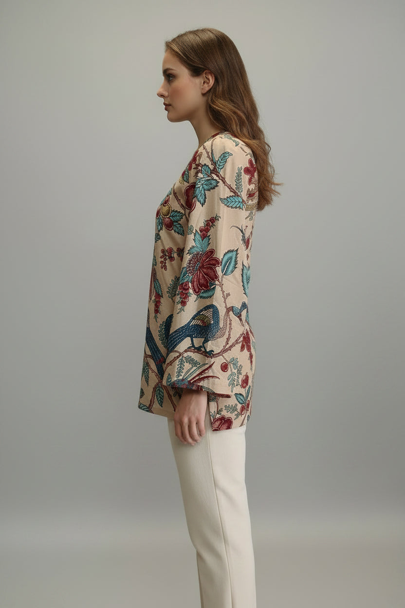 wearing a floral patterned garment against a plain background