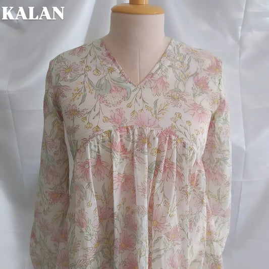 White Floral Peplum Top – Minimal & Elegant