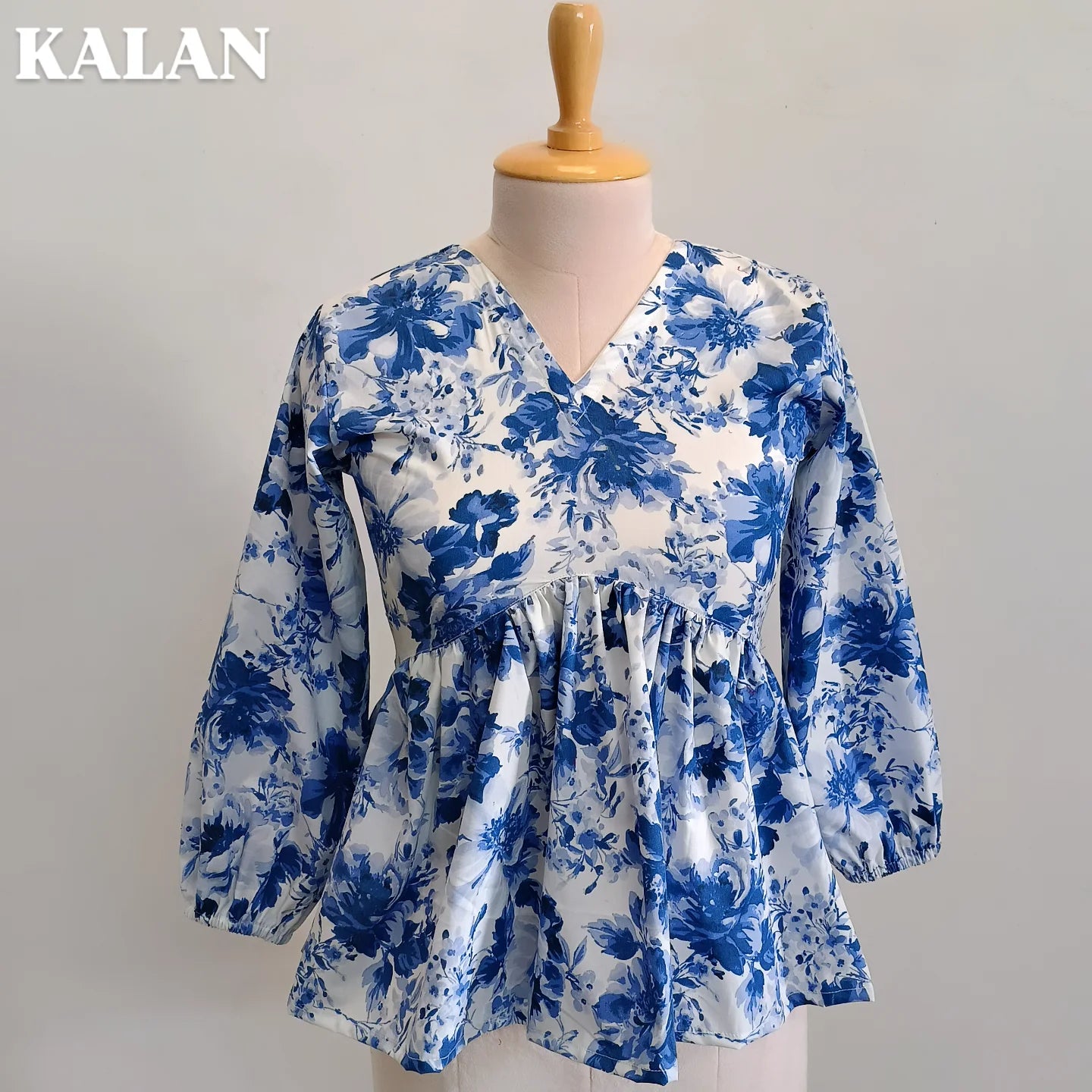 Blue Belle Peplum Top – Timeless Elegance