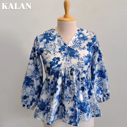 Blue Belle Peplum Top – Timeless Elegance