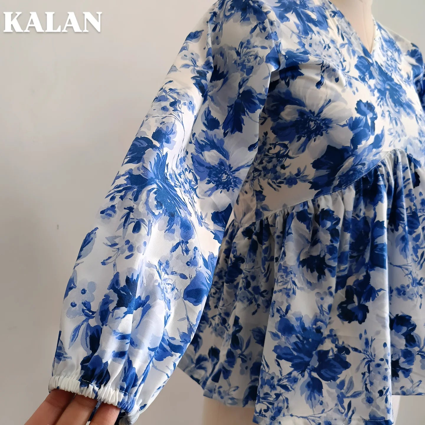 Blue Belle Peplum Top – Timeless Elegance