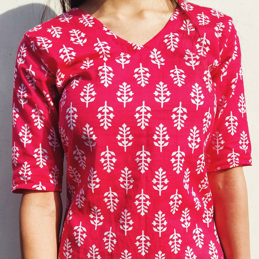 butti print kurti  worn by a person