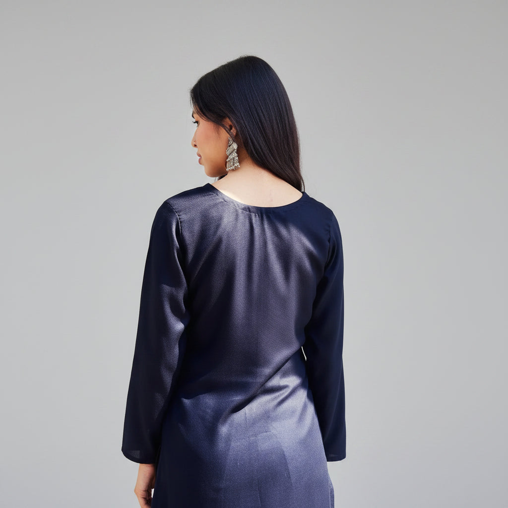Woman wearing a black kurti with a round neckline 